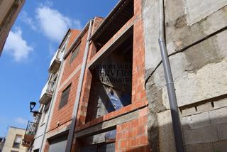 Casa adossada a Cálig