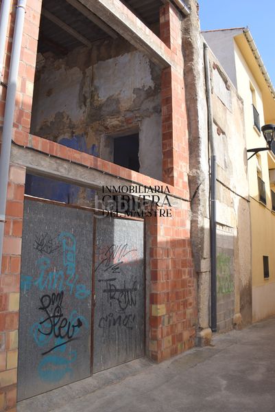 Foto ed5fbabd-7cd5-49cd-8c45-ea79900f662e. Casa adossada a Cálig