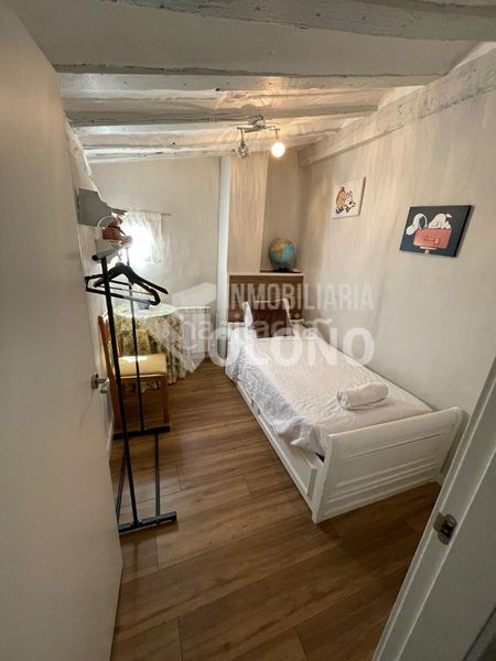 Foto fd79d4f2-998c-41c2-9e45-d7c0f51e9588. Casa aparellada a calle labradores 14 a Anguciana