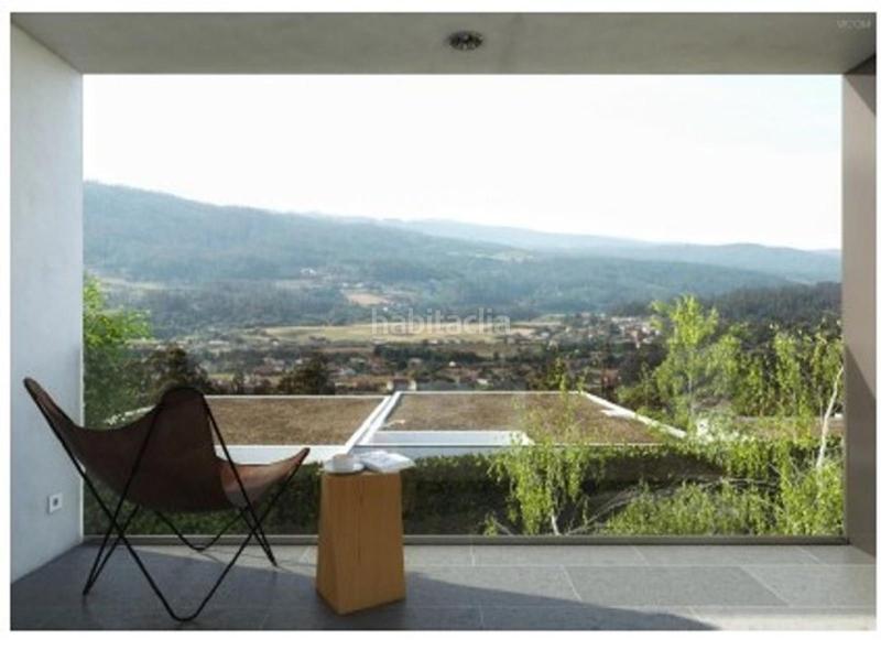 Foto 17d010e4-3ba4-4066-8394-9c272cfcf89e. Casa aparellada amb calefacció aparcament piscina a Ames