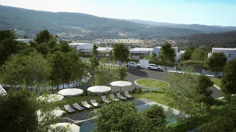 Foto 20998d66-0da3-43e6-bd9d-d86edbcedb3d. Casa aparellada amb calefacció aparcament piscina a Ames