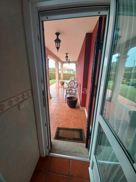 Foto 05f4dde3-0cc7-431e-938b-d265bf97a727. Chalet with fireplace heating parking in Dorneda Oleiros