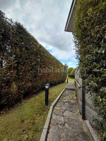 Foto 5e6bc60b-a669-4d5c-9e6b-e68533f512ca. Chalet with fireplace heating parking pool in Liáns Oleiros