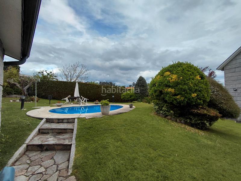 Foto 7da6f1b1-715e-454b-907f-f39df8cf7a4e. Chalet with fireplace heating parking pool in Liáns Oleiros