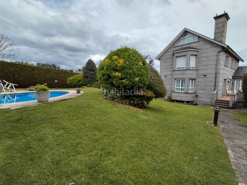Foto c0be3cf8-c13f-44c0-b917-4857cec06059. Chalet with fireplace heating parking pool in Liáns Oleiros