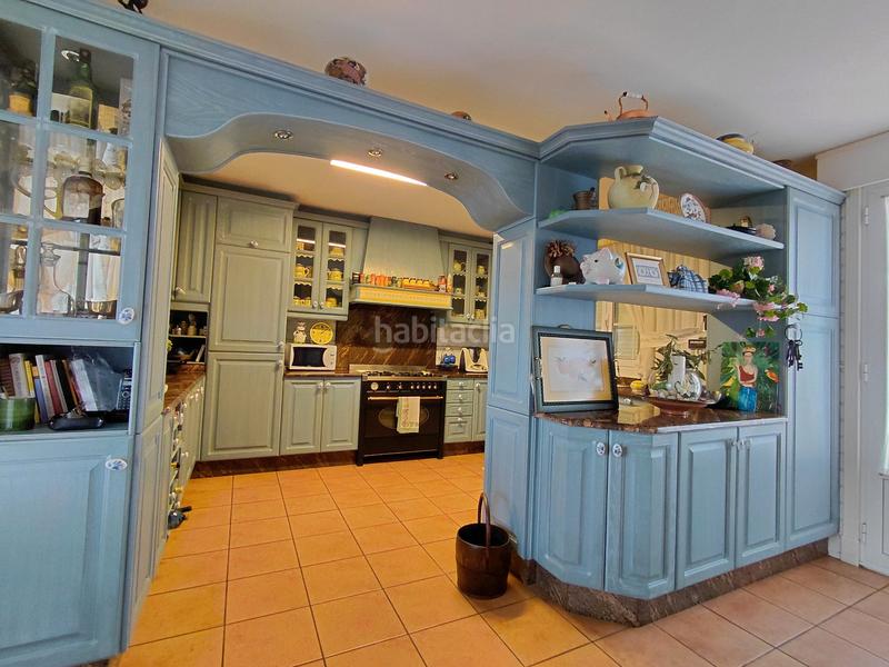 Foto dccf37f7-d3cb-4fac-bd6b-4c65a33af548. Chalet with fireplace heating parking pool in Liáns Oleiros