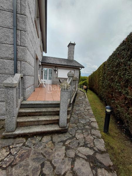 Foto f4ac1868-7fe8-40de-af22-3cd906150c4b. Chalet with fireplace heating parking pool in Liáns Oleiros