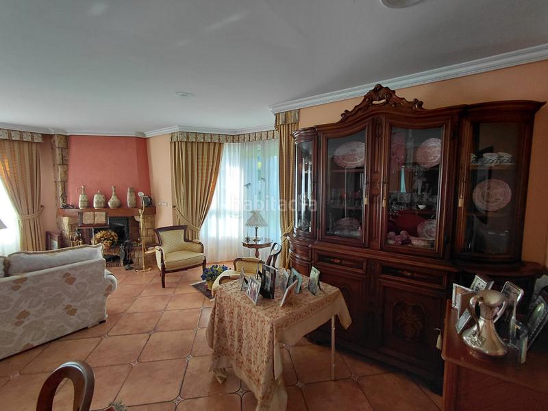 Foto 719f7129-8307-421a-8061-80f932a67d57. Chalet avec cheminée chauffage parking piscine dans Oleiros