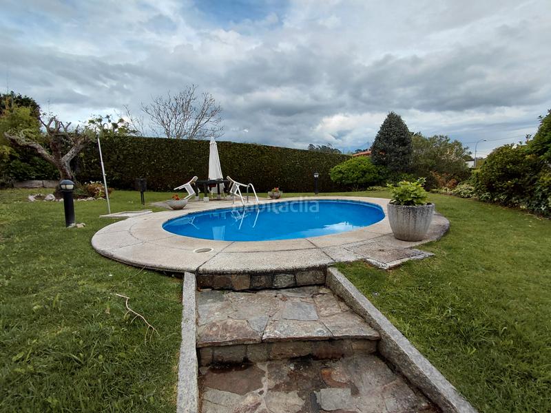 Foto 85e2bfed-fc0a-493c-8d52-644a97b1c672. Chalet avec cheminée chauffage parking piscine dans Oleiros