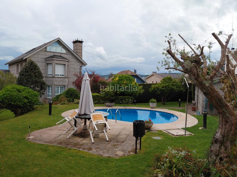 Foto e7a64e1b-1a41-46df-982b-a112bf04711a. Chalet avec cheminée chauffage parking piscine dans Oleiros