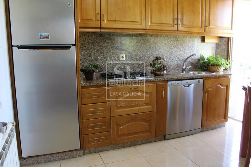 Foto fd1baa1a-c117-45f0-b37c-0beba9db059e. Casa a schiera con riscaldamento parcheggio in Comesaña - Matamá Vigo