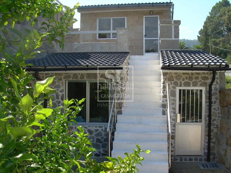Foto 1f6b2c99-2ba9-465d-ae25-573a13738811. Chalet with heating parking in O Hío Cangas