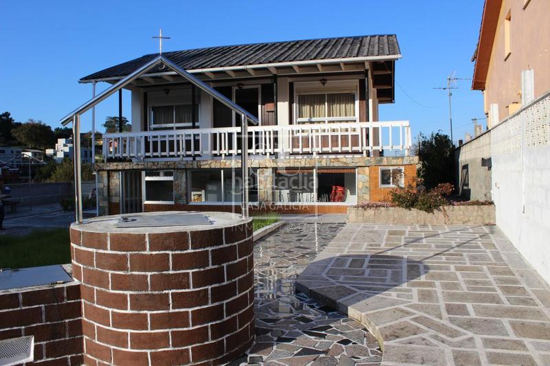 Foto d41def72-d821-42f1-abd5-636eb69900d2. Chalet avec chauffage parking dans O Hío Cangas