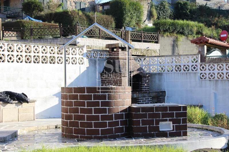 Foto 2f28a9f9-992d-4ec5-af08-75d86bd431f8. Xalet amb calefacció aparcament a O Hío Cangas