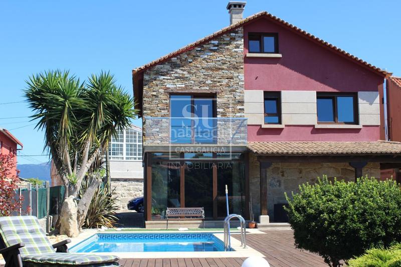 Foto 0841800e-c898-4b20-9d85-41f51aa77c74. Chalet con riscaldamento parcheggio piscina in San Pedro da Ramallosa Nigrán