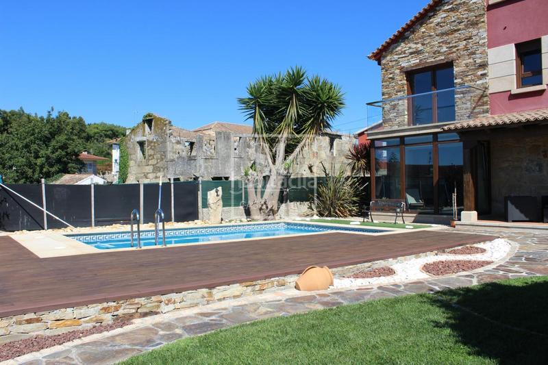 Foto 0d300ae6-5743-4a2a-8ef9-781709ad73d2. Chalet con riscaldamento parcheggio piscina in San Pedro da Ramallosa Nigrán