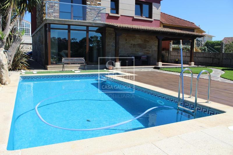 Foto 539b0199-2260-4c95-97fc-74a00475278d. Chalet con riscaldamento parcheggio piscina in San Pedro da Ramallosa Nigrán