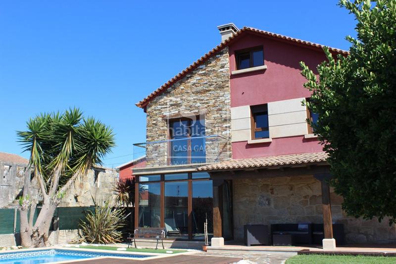 Foto 7295849c-f3b3-4ef0-ba53-9776ec451543. Chalet con riscaldamento parcheggio piscina in San Pedro da Ramallosa Nigrán