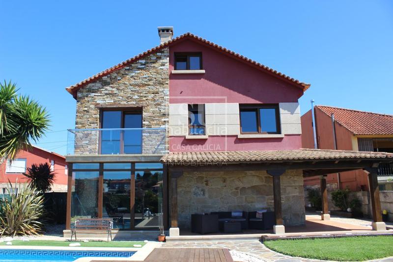 Foto b972e647-0c6f-4fba-bb88-dbc188bdf10c. Chalet con riscaldamento parcheggio piscina in San Pedro da Ramallosa Nigrán