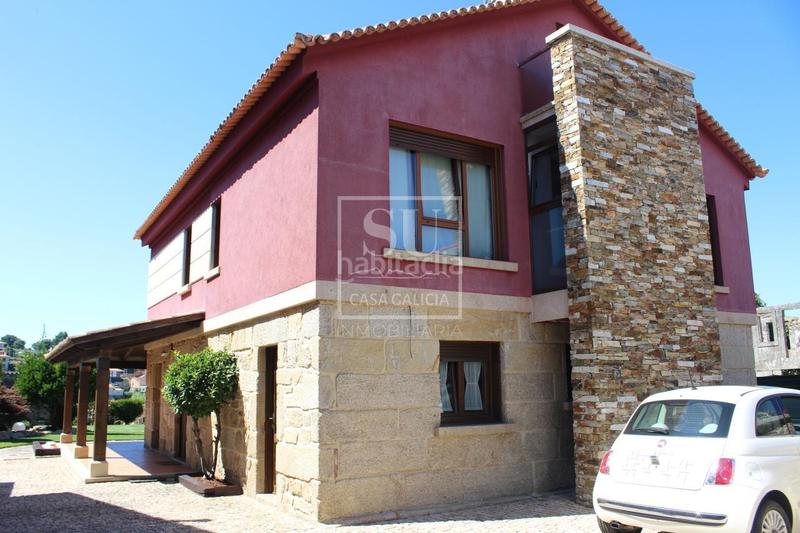 Foto dcc2a578-3bcd-404f-a6da-63fd125c1e00. Chalet con riscaldamento parcheggio piscina in San Pedro da Ramallosa Nigrán