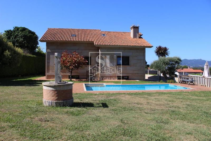 Foto 0123732a-d992-48c6-a69b-a28efe93c821. Chalet con riscaldamento parcheggio piscina in Baiona