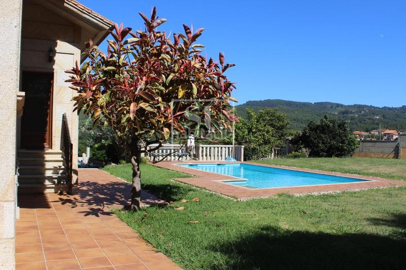 Foto 0e8576b2-4851-4759-8d41-0dd117386641. Chalet con riscaldamento parcheggio piscina in Baiona