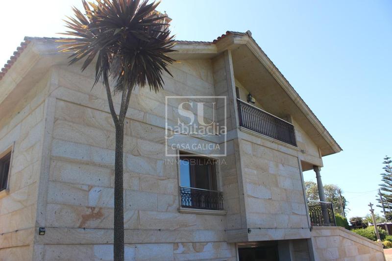 Foto ca37cdd6-89dc-4297-b5f2-413cff0bcd8b. Chalet con riscaldamento parcheggio piscina in Baiona