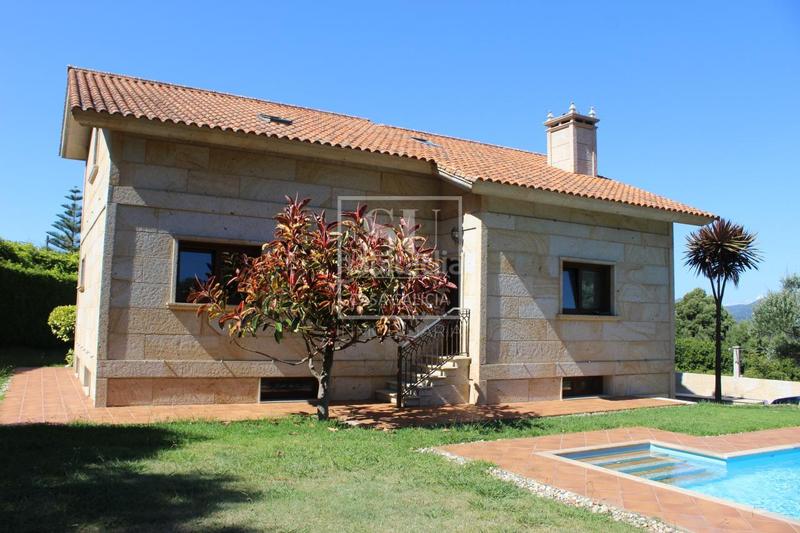 Foto e642ac56-3b5f-4bcc-b728-2c2a04fb5c4e. Chalet con riscaldamento parcheggio piscina in Baiona