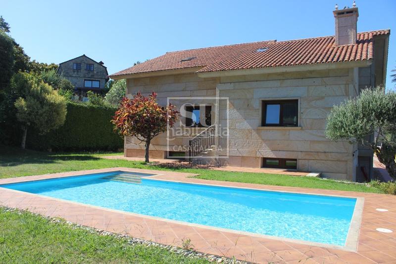 Foto ff0dd482-80a8-4d66-911c-64b9a73e8cf9. Chalet con riscaldamento parcheggio piscina in Baiona