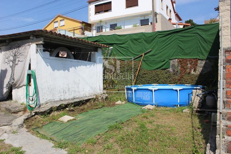 Foto e6c1f787-82e3-4bc5-901e-3361222f98a6. Haus mit heizung in Bueu