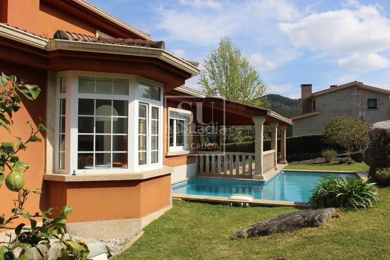 Foto 4e822937-0931-4912-aa15-c023e17ed849. Chalet mit heizung parking pool in Baiona