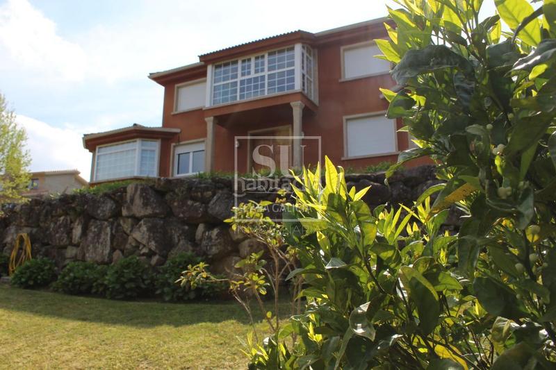 Foto 3bd95c19-a3cc-4d16-ae72-d416515dc784. Chalet con riscaldamento parcheggio piscina in Baiona