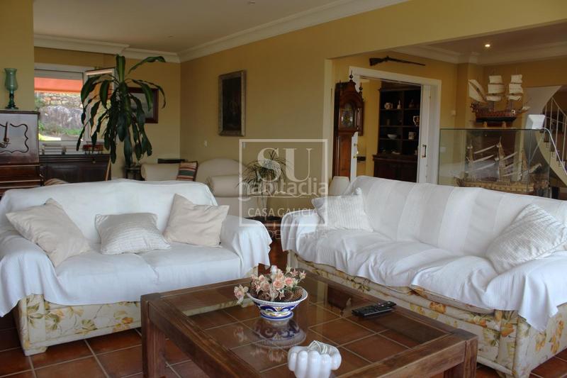 Foto 50066e1b-57cf-48fd-834d-afdce339c6b8. Chalet con riscaldamento parcheggio piscina in Baiona