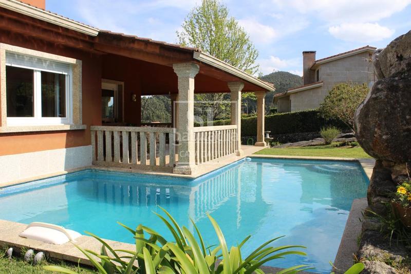 Foto 9b9cc5b7-5fbb-4bf1-b561-c3303d551ff7. Chalet con riscaldamento parcheggio piscina in Baiona