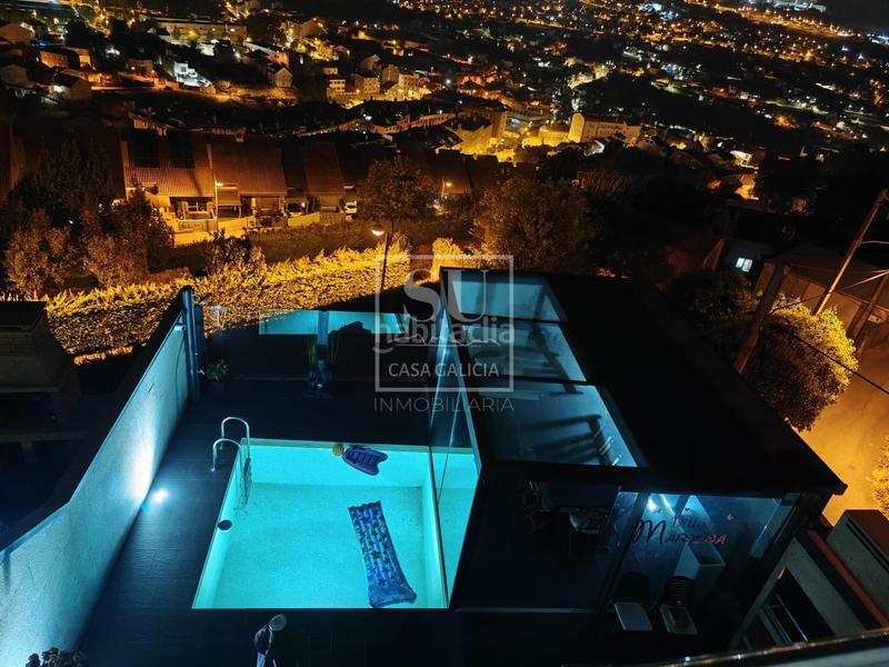 Foto 7de12ddb-ccc6-46db-a13c-cfb3b9612e6d. Casa aparellada amb calefacció aparcament piscina a Vigo