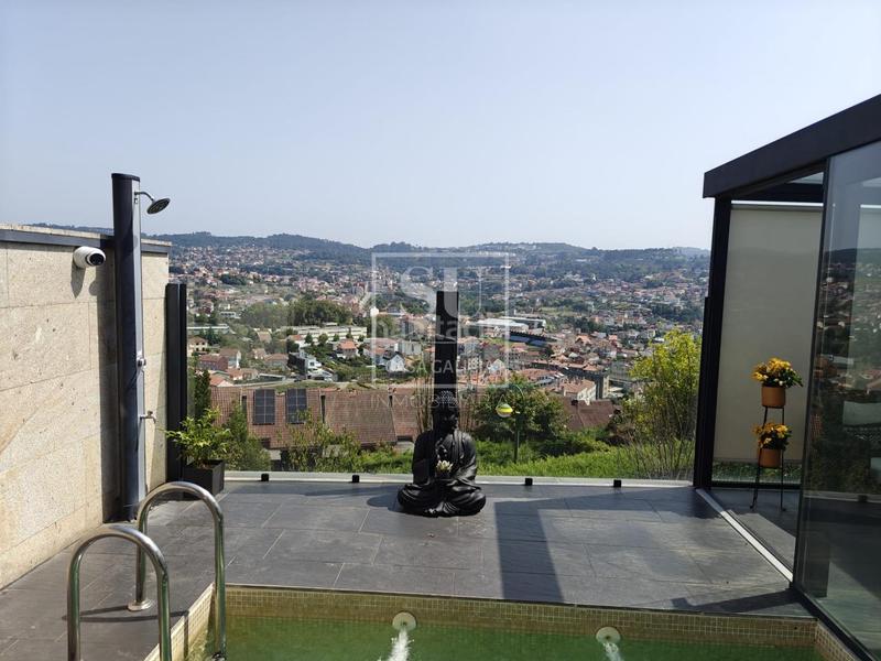 Foto 870ad14d-734a-43b5-801d-39baf982104b. Casa pareada en Lavadores Vigo