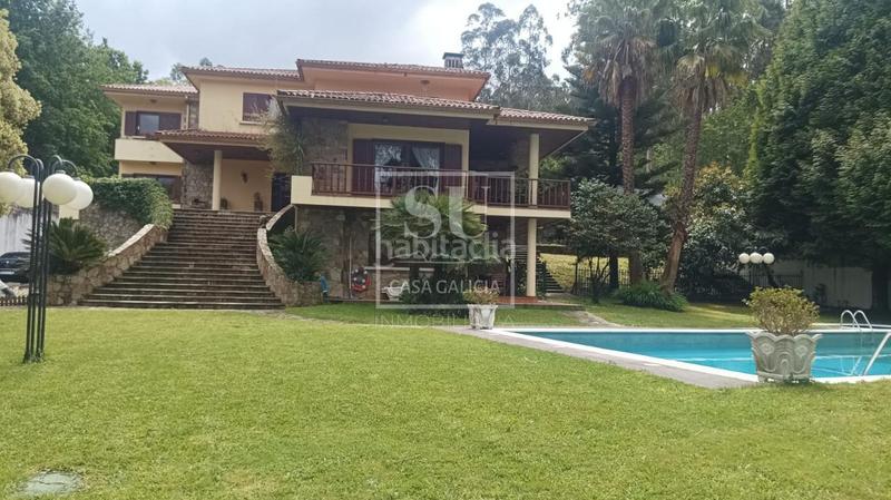 Foto 1d38193d-0b38-45c6-b81a-8e7448b26d4a. Chalet con riscaldamento parcheggio piscina in Gondomar