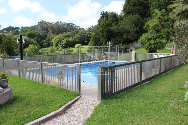 Foto 48ed8647-e5cf-48ce-9eaa-fe18c2d5f74e. Xalet amb calefacció aparcament piscina a Nigrán centro Nigrán