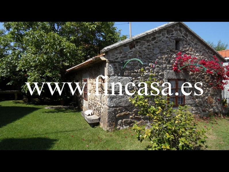 Foto 6f4fd51c-d6ca-41d9-8d43-5c02dc7cb570. Chalet en Panxón Nigrán