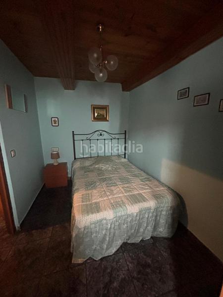 Foto 305c9463-dc72-4164-8fa7-f2e3cd5a0308. Casa adosada pumarada en Laviana