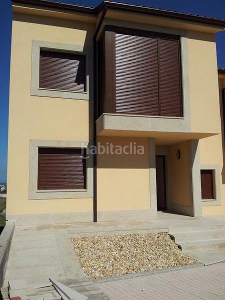 Foto 108229a7-57c3-497c-8384-c37ef7785eac. Casa pareada se vende chalet adosado en Laxe
