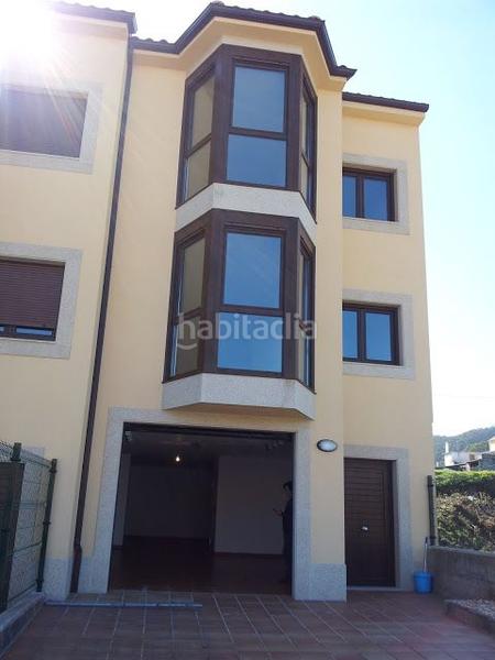Foto ee56f18f-14ea-422a-a295-be4ffc443226. Casa pareada se vende chalet adosado en Laxe