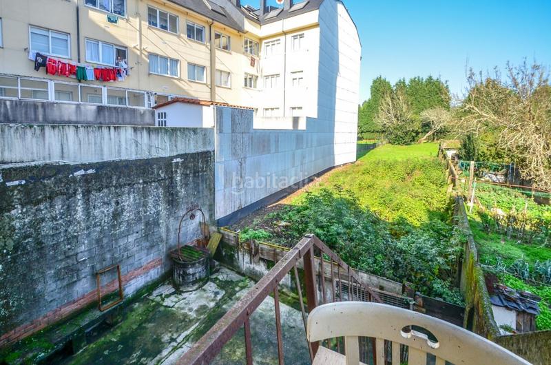 Foto a30ffe08-e433-4f4d-9b57-3f2f617e538c. Edificio en carretera estrada castela 887 edificio de bajo y dos plantas en xubia, al lado del antiguo concello en Narón