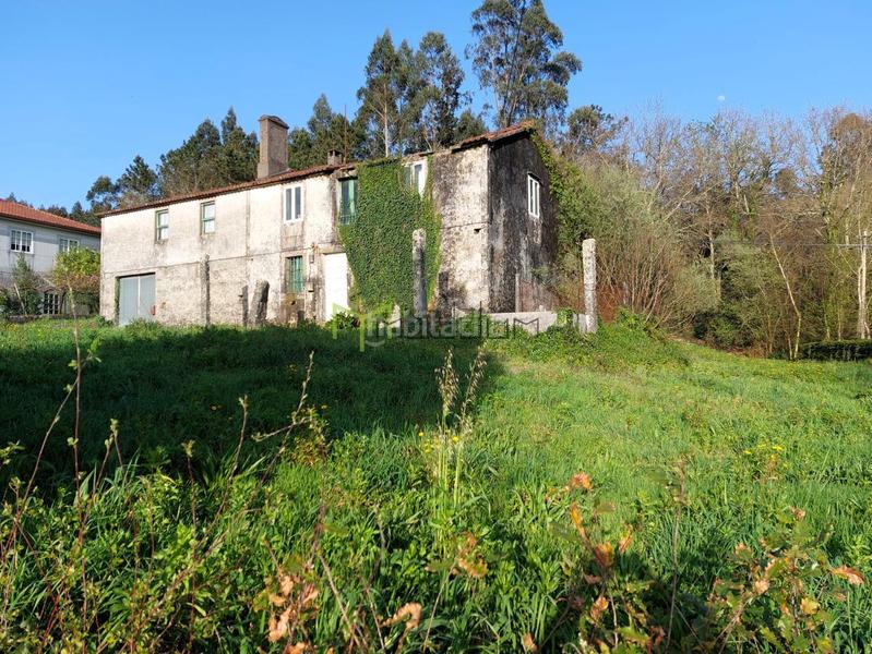 Foto afbfc6dc-75f0-4676-a6f0-b49ccc22600c. Casa amb aparcament a área de Ames Ames