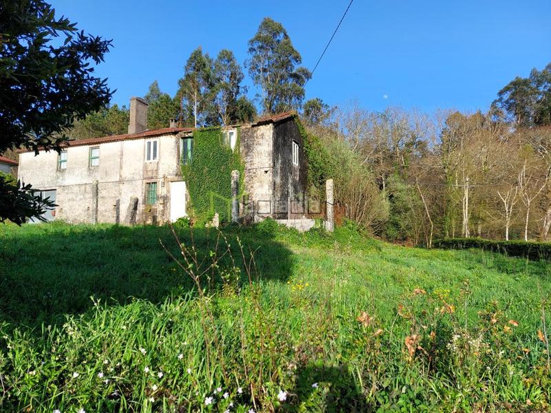 Foto 9d445b8e-2f90-4f47-9639-2c894656250f. Maison avec parking dans área de Ames Ames