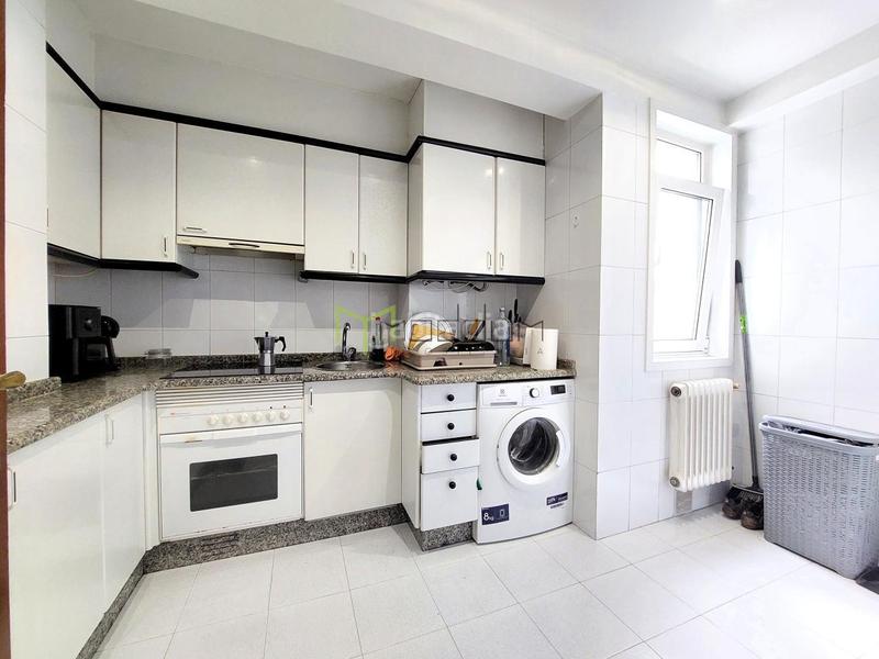 Foto 30035d00-a726-48c7-aaab-32eee1286109. Appartamento con riscaldamento parcheggio in O Milladoiro Ames