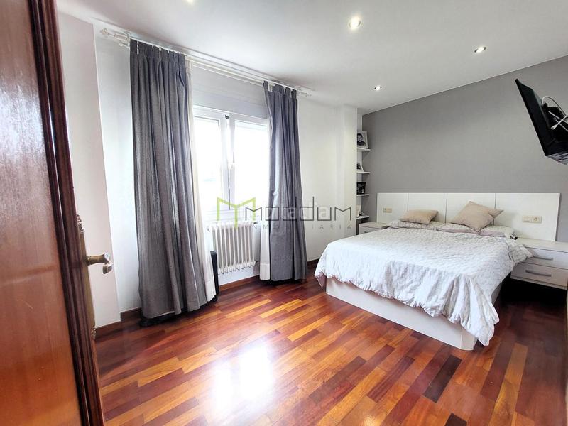 Foto afd263dc-7383-458f-8b63-d22579d86555. Flat with heating parking in O Milladoiro Ames