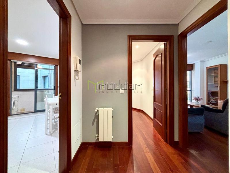 Foto 236f89f1-39ec-497b-bbf1-52b59a190f11. Rent flat with heating parking in O Milladoiro Ames