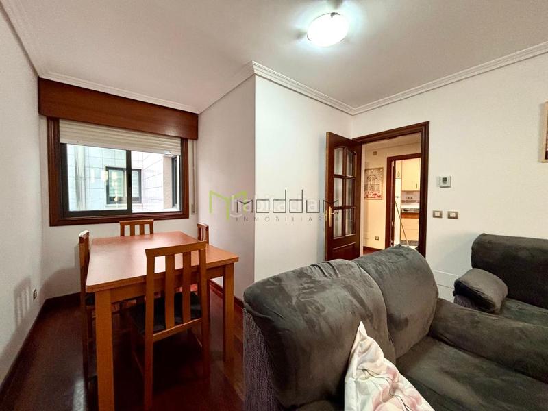 Foto 2b31a502-5f6f-47ba-a094-0c01e03f5645. Rent flat with heating parking in O Milladoiro Ames