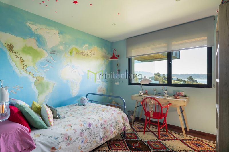 Foto a65b1b34-dab1-47c2-a2c8-50f4a622aaa5. Casa amb calefacció aparcament a Bueu